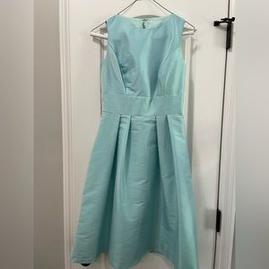 Alfred Sung “Seaside” dress by Dessy. Cocktail length dupioni dress.